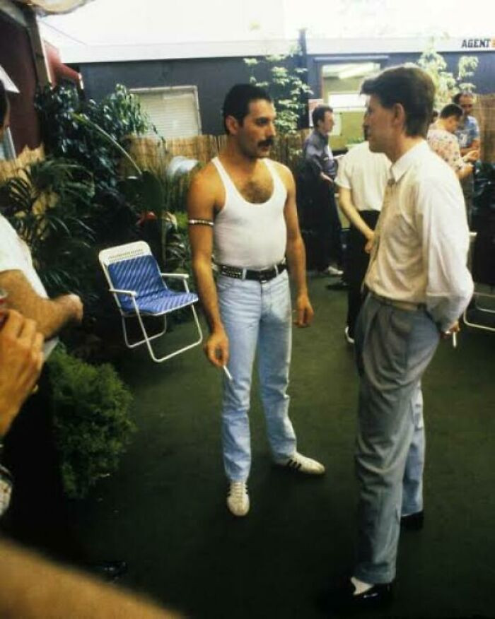 22. Freddie Mercury talking to David Bowie at Live Aid in 1985
