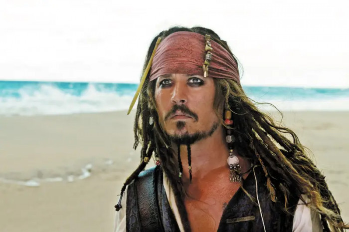 7. Johnny Depp acting as Jack Sparrow in the Pirates of the Caribbean movies
