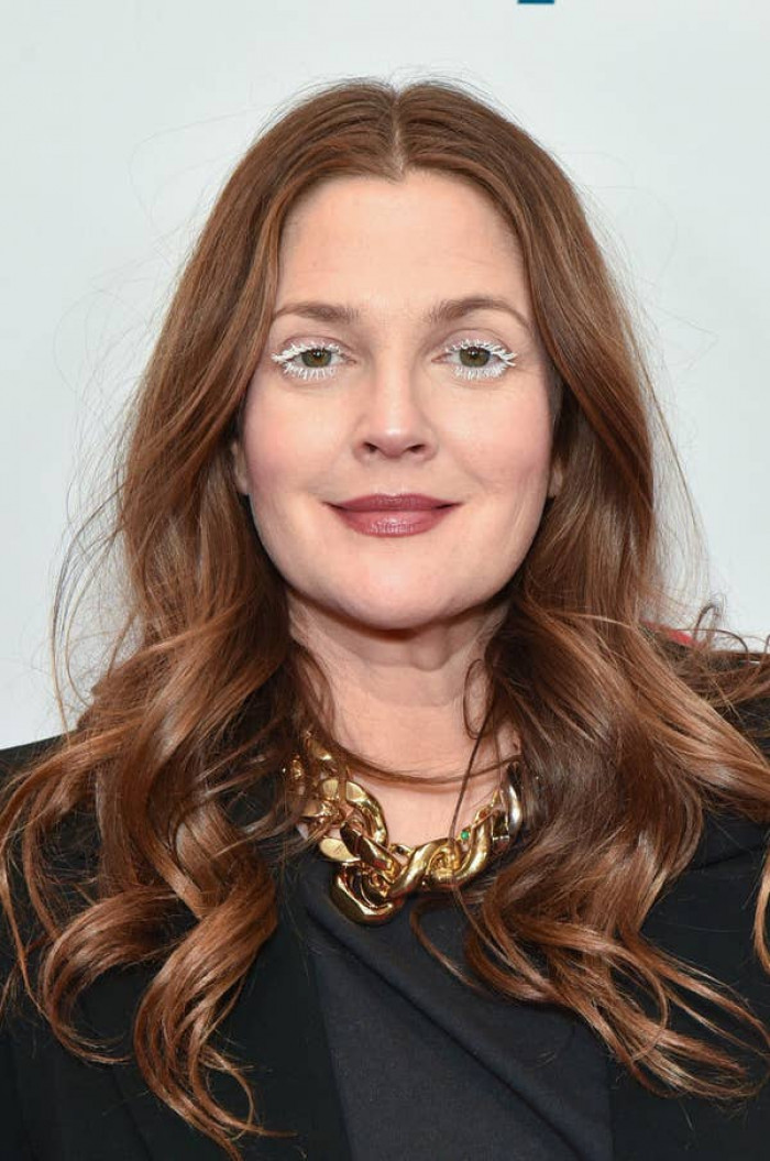 11. Drew Barrymore's mom put her daughter in a dog commercial when she was only 11 months old.