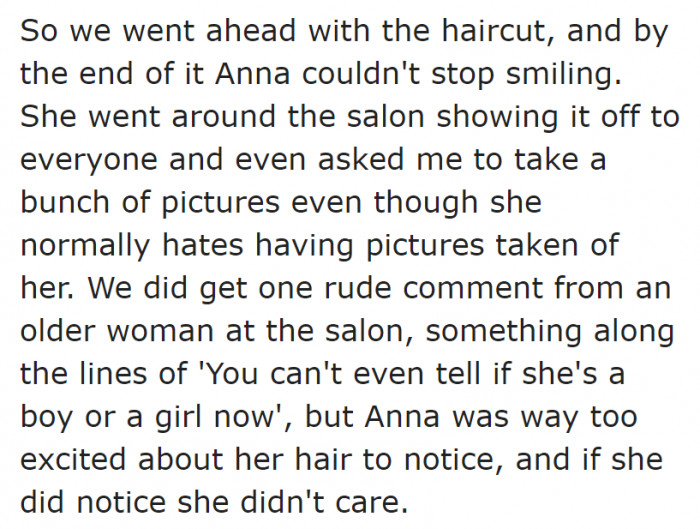 The kid was so happy with her brand-new haircut.