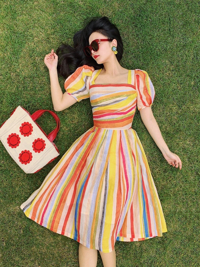 27. A dress of rainbow stripes perfect for warm weather.