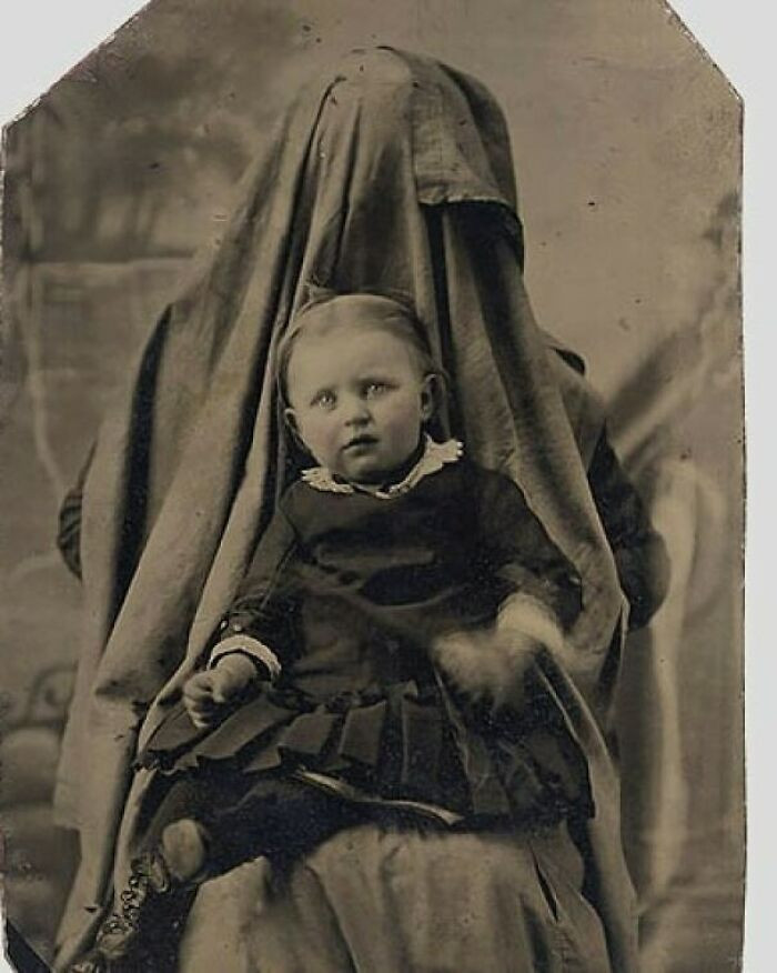 29. "Photograph Of A Victorian Baby Held By Their Mother"
