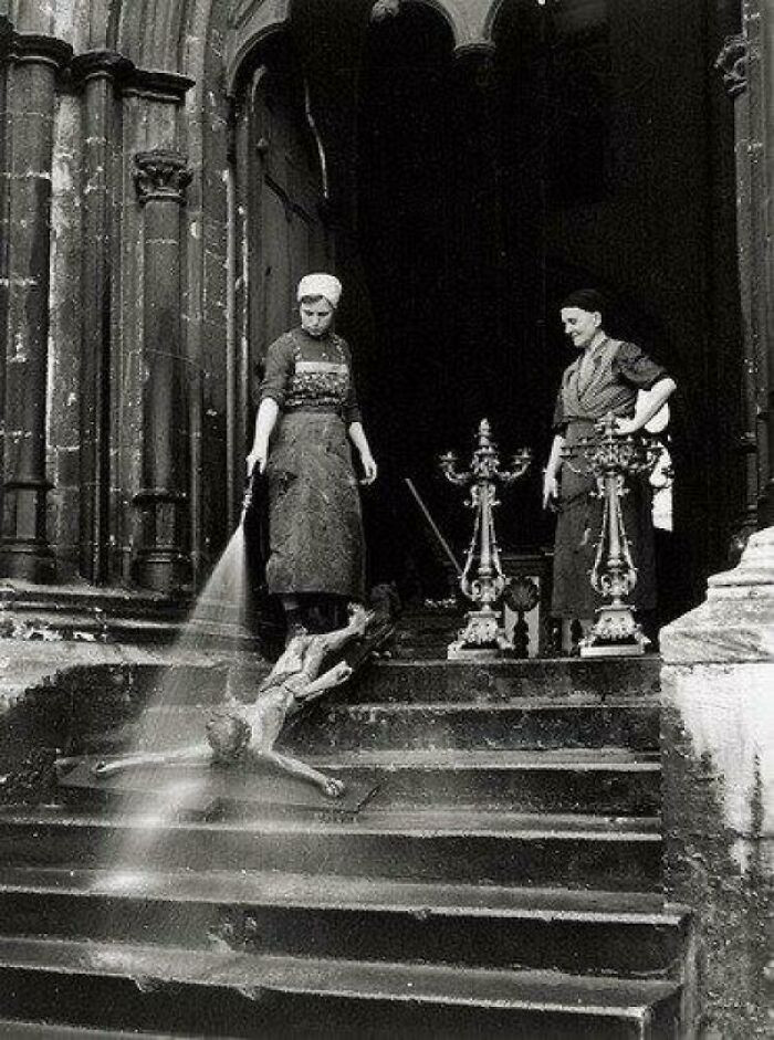 15. "Washing A Crucifix, 1938"