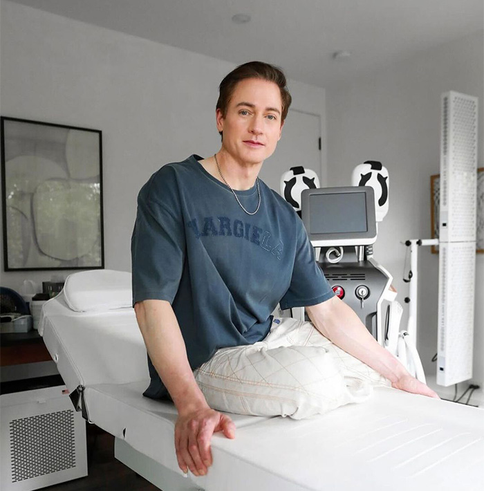 Bryan Johnson lounges post-procedure, determined to redefine the limits of the human body.