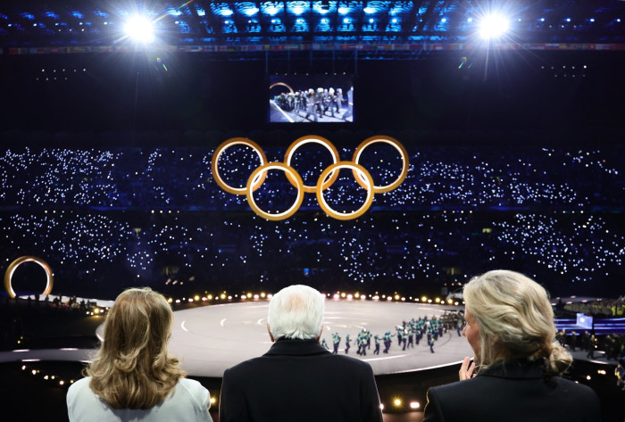 Olympic committee officials address media, amid crowd boos during opening ceremony