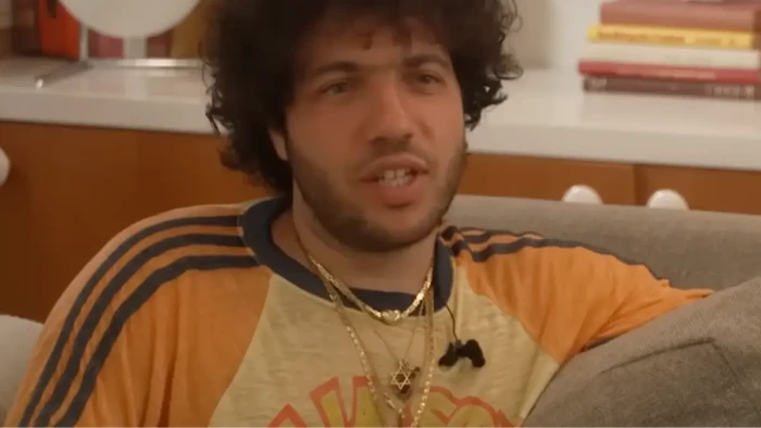 Benny Blanco appears relaxed on Kimmel Live during a humorous interview moment