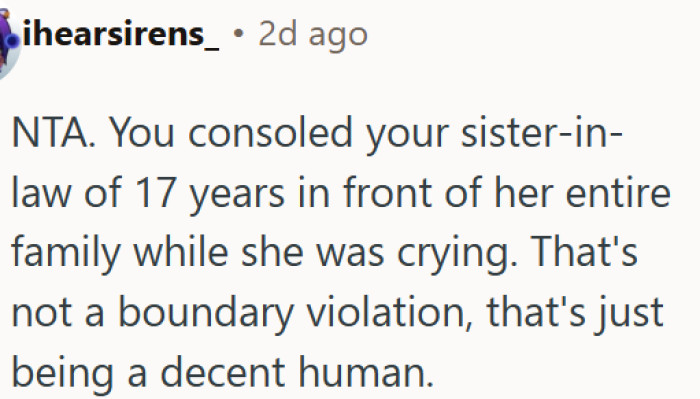 Comforting a crying sister-in-law in front of family is not a boundary violation