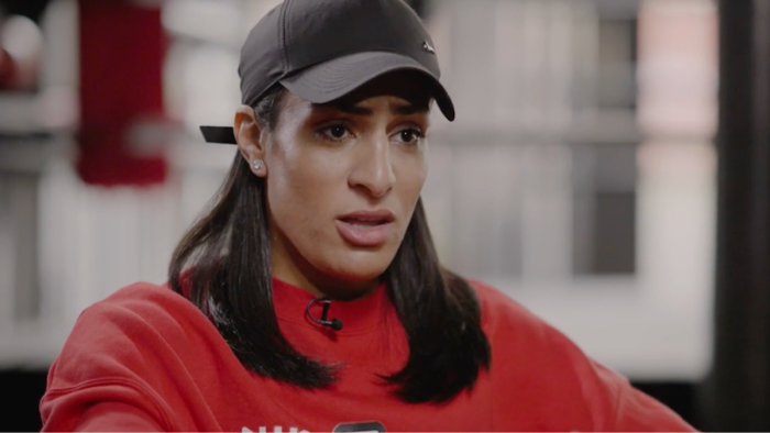 Imane Khelif addressing Trump, standing in boxing arena during Olympics coverage