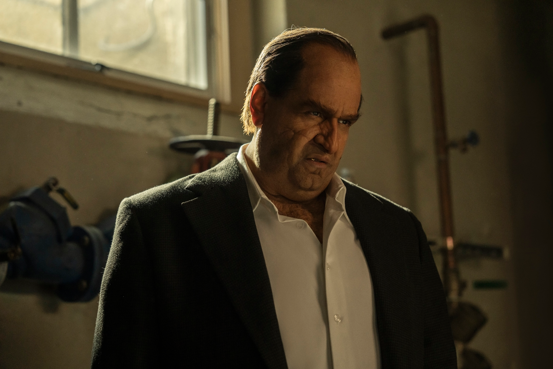 Colin Farrell, fully transformed into Gotham’s slimiest kingpin, thanks to some serious prosthetic magic