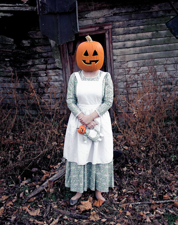 37. My Girlfriend's Halloween Costume. Creepy Pumpkin Lady And Her Little Dolly