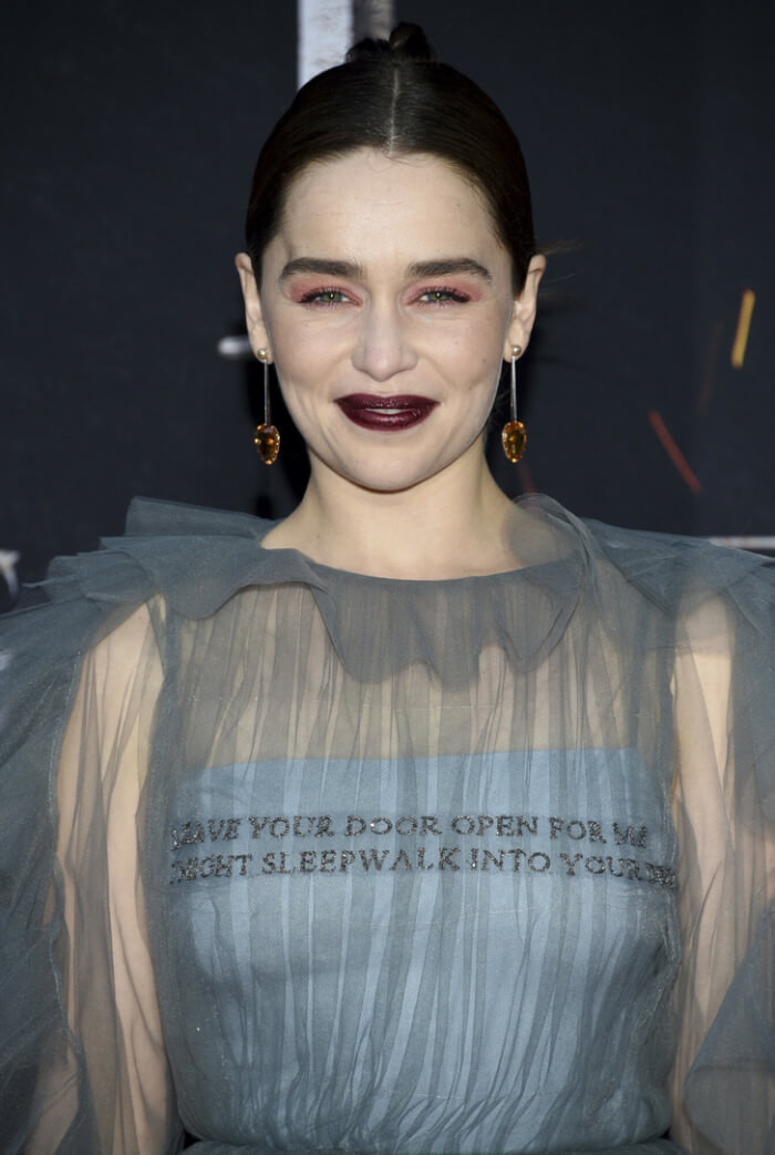 6. Emilia Clarke wore a dress bearing the message, “Leave your door open for me. I might sleepwalk into your arms” to the opening of the eighth and final season of Game of Thrones