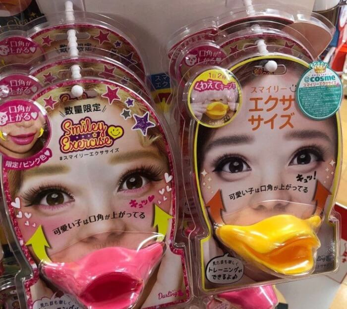 12. This is a gadget to train the mouth corners to lift and make the smile more symmetrical.