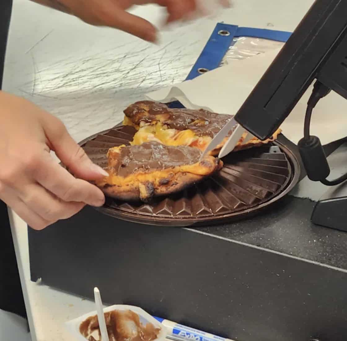 16. “The way my coworker likes her pizza. Yes, that is chocolate pudding.”