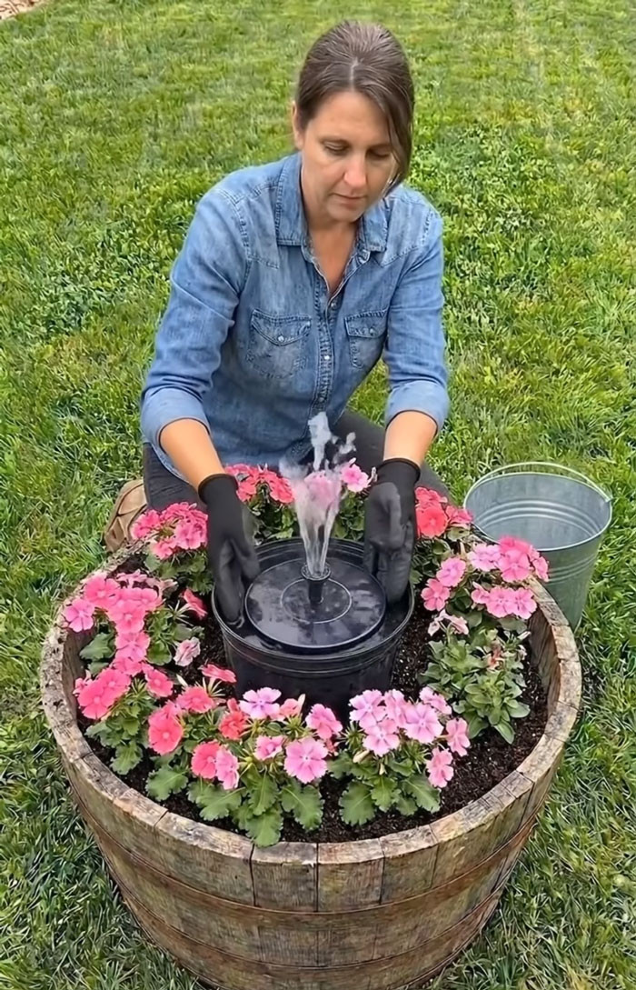 "Turn A Wooden Barrel Into A Stunning Flower Planter With A Bubbling Fountain That Brings Your Garden To Life"