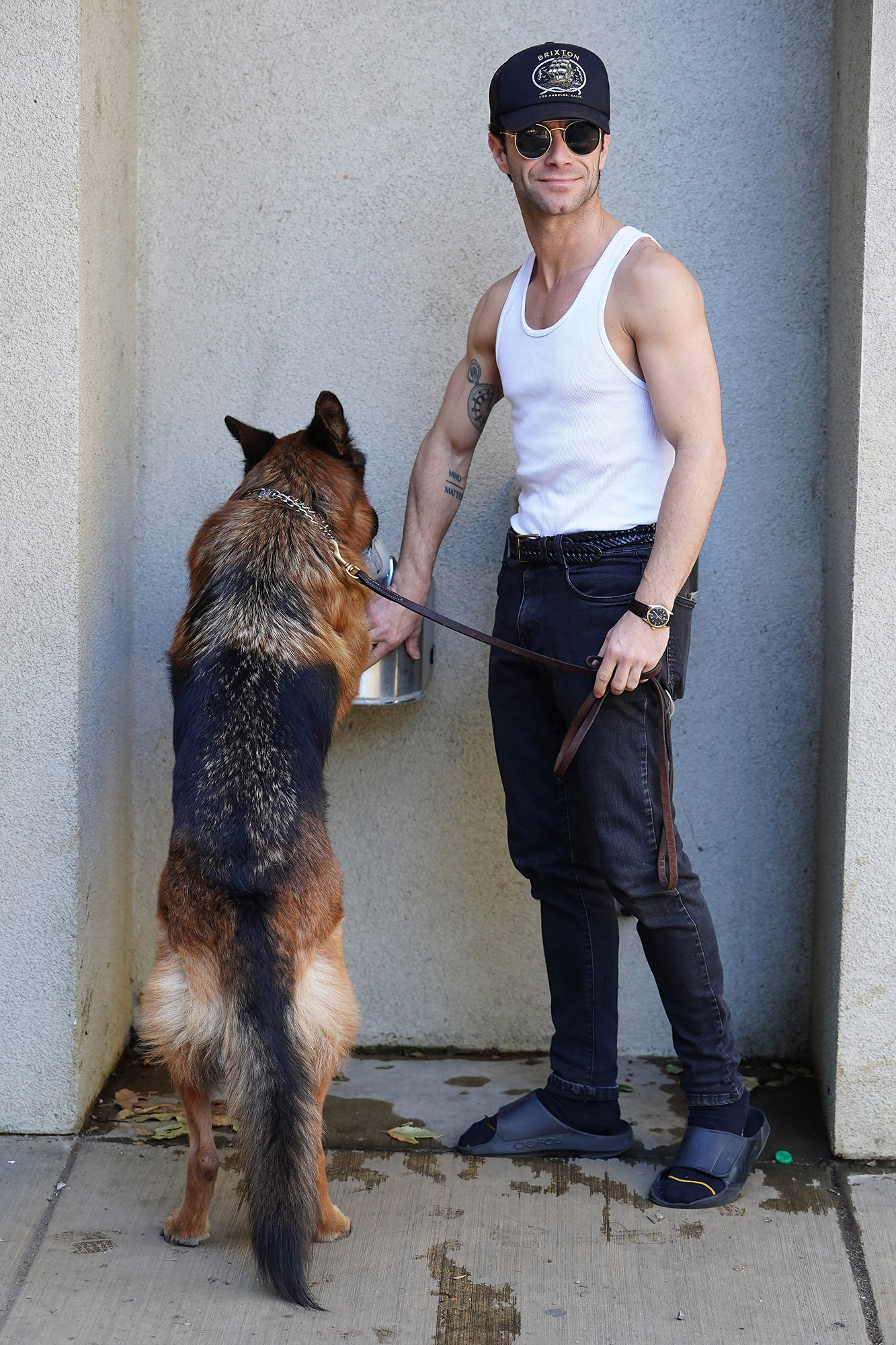 18. Sasha Farber took his dog for a stroll on the streets of LA