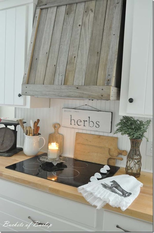14. Enhance the rustic ambiance of your kitchen by covering a vent with reclaimed wood.