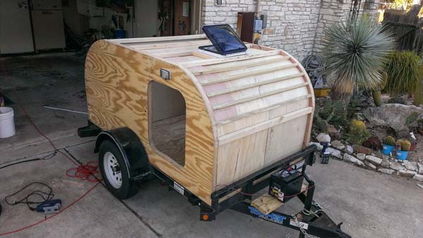 Now, it's mostly all closed in, aside from putting the doors on, and it definitely looks like a little camper.