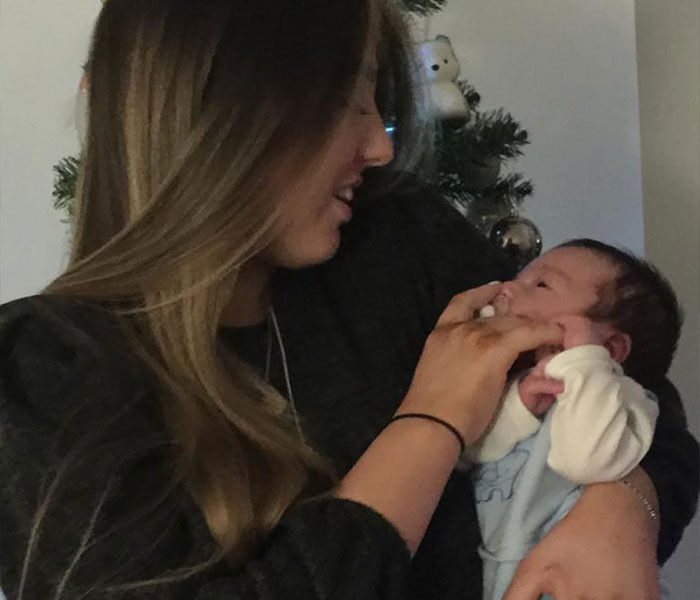 She's raising him as a single parent with the help of her brother and sister-in-law