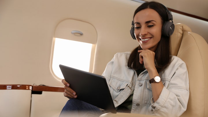 Downloading movies and TV shows to your device for a flight is a great way to pass the time.