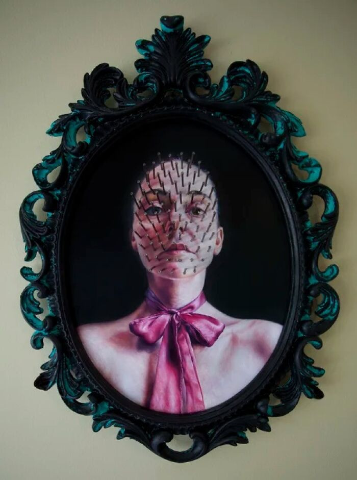 "Oil on wood with applied nails."