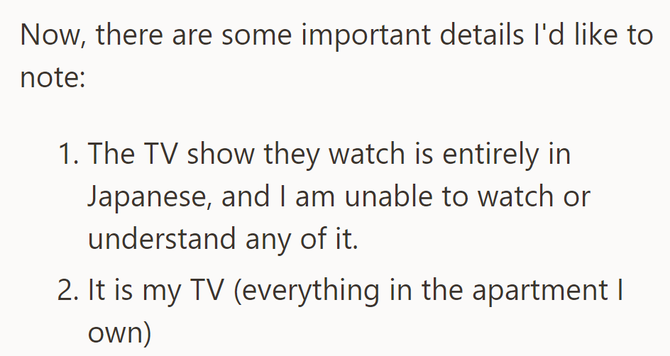 Roommate's show is in Japanese, which he can't understand; he asserts TV ownership in the apartment.