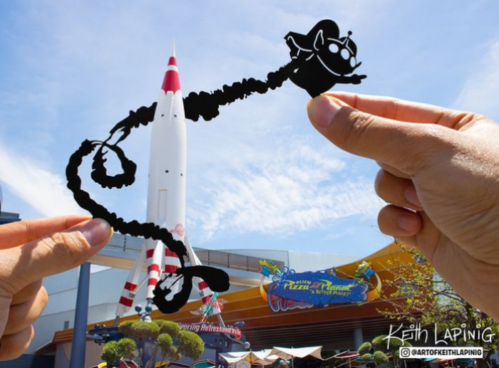 22. A Toy Story Alien zooming around Tomorrowland