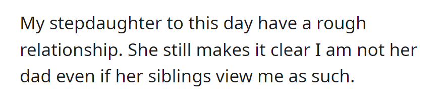 Stepfather's distant relationship with stepdaughter persists; she rejects him as her dad while her siblings accept him.