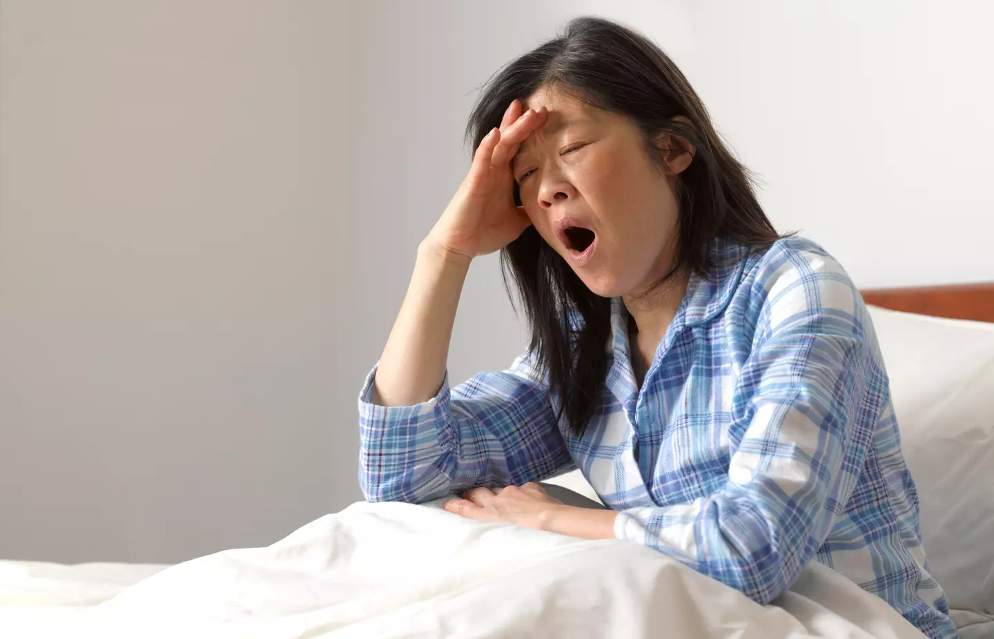Difficulty waking up can be a symptom of ADHD.