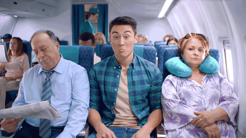 12. If you're in the middle seat, tuck in your legs with a blanket so they're close together, giving you room to relax without worrying about bumping into your neighbors