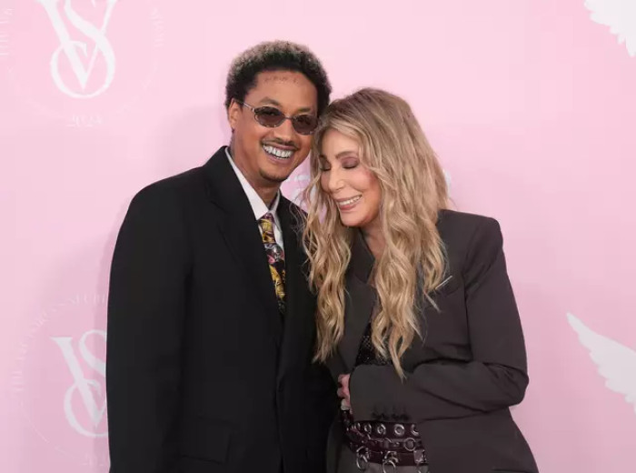 Cher laughs off criticism and says she’s just enjoying life with her younger boyfriend.