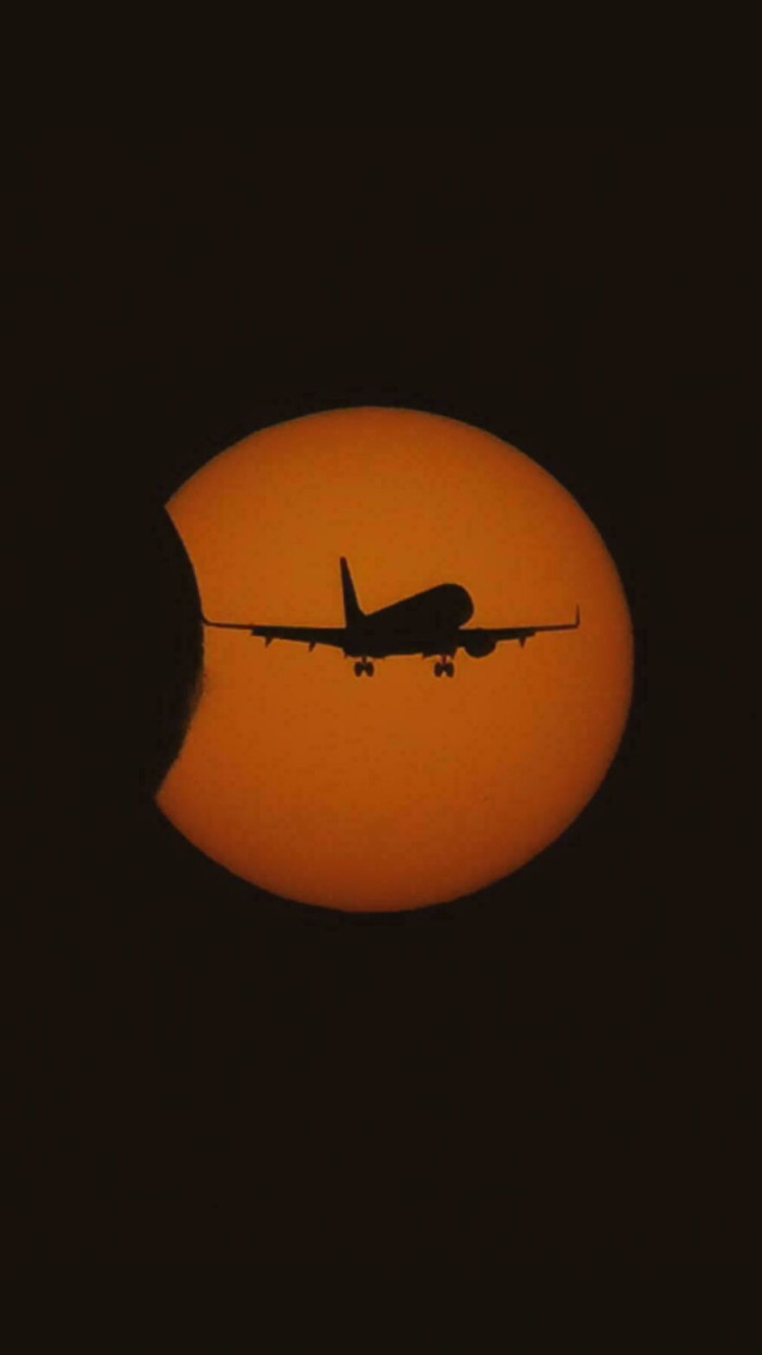 "A Plane Landing at City Airport Got in Front of My Eclipse Shot"