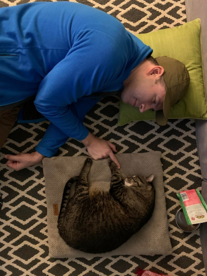 33. Our firstborn just came home from the vet with a probable cancer diagnosis. I came into the living room to find my significant other watching her while she sleeps.