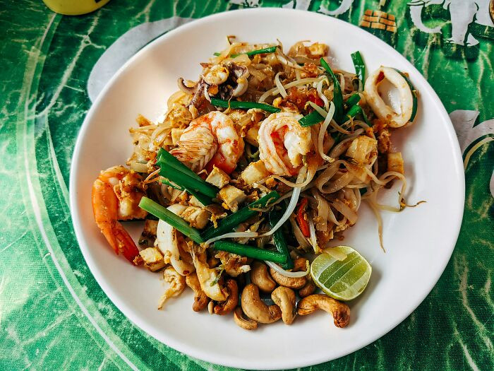 Pad Thai wasn't an organic culinary tradition; it was deliberately created by the Thai government precisely because the country lacked a recognizable national dish.
