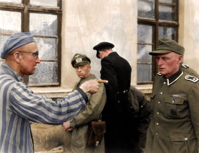 "Russian Inmate Points An Identifying And Accusing Finger At A N**i Guard Who Was Especially Cruel Towards The Prisoners In Buchenwald Camp"