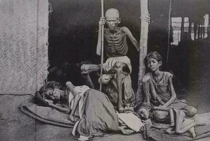 "Man Guards His Family From The Cannibals During The Madras Famine Of 1877 At The Time Of British Raj, India"