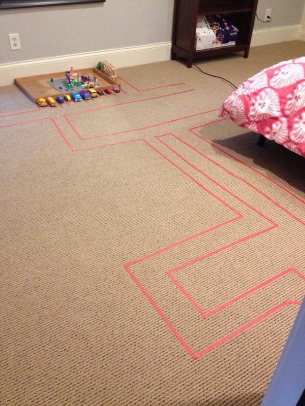 1. Make roads for toy cars by using colored tape on carpet