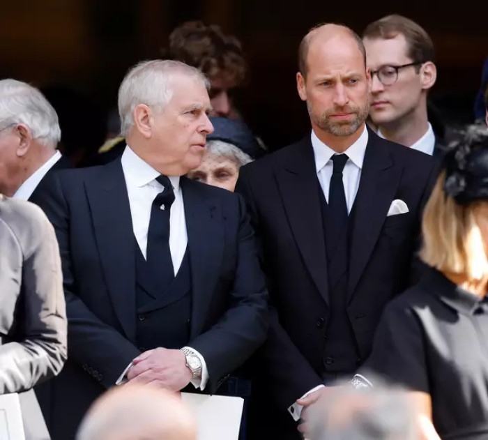 William keeps his distance as social media debates his frosty funeral moment with Andrew.