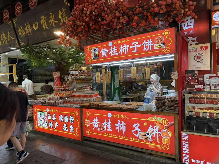 "Muslim Quarter Woman Selling Persimmon Sweets, Xi'an"