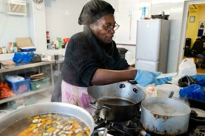Elaine Roberts Who Arrived In London From Jamaica In The Early 1960s, Helping Her Team To Prepare Free Food Packages In Clapham, Mainly For Carribean Elders. (Image - Jim Grover)