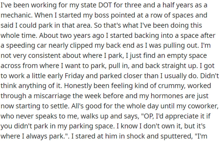 OP parked in a spot her coworker claimed as his, even though there were no assigned spots