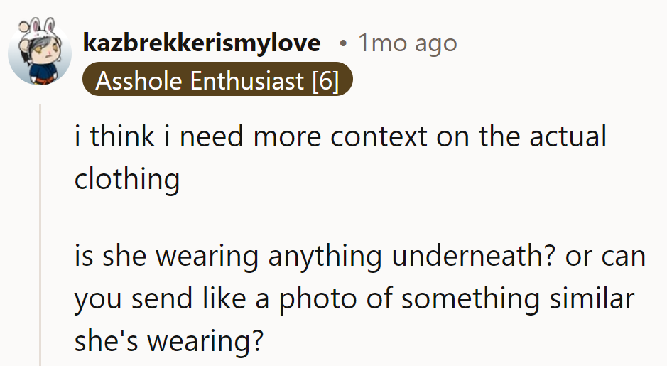 Need more context on the clothing—like, is she wearing anything underneath? A photo would help.