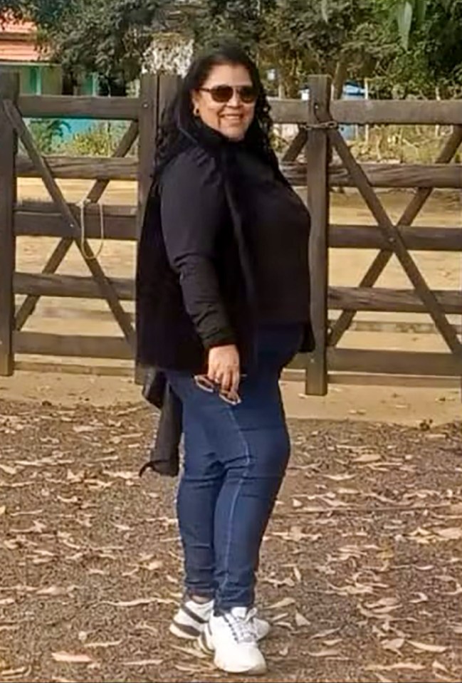 Adriana Maria de Jesus, 45, was on her way to work when she and two men entered the lift.