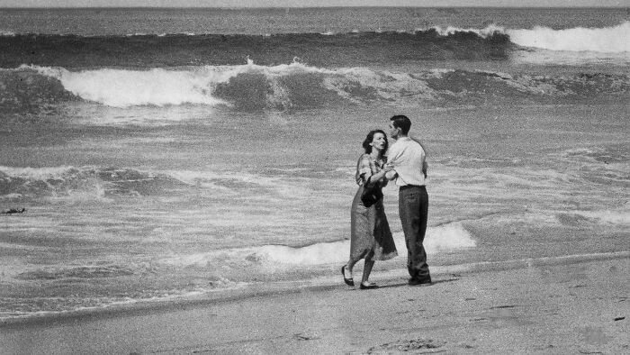 “Tragedy by the Sea,” a haunting photograph capturing John and Lillian McDonald just moments after their 19-month-old son, Michael, was pulled into the ocean and lost along the shore of Hermosa Beach, California, in 1955.