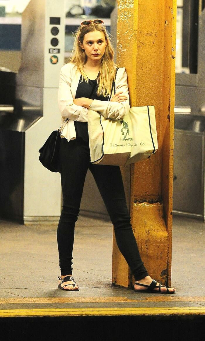 4. Elizabeth Olsen waiting to board public transport