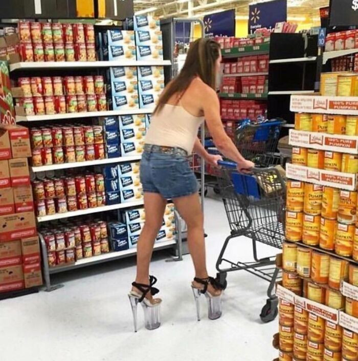 Lemur in a local grocery store, Michigan Walmart aisle with shoppers
