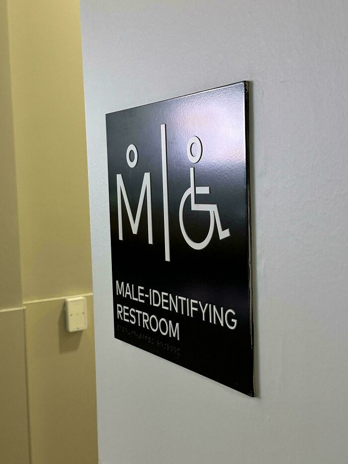 "This Men’s Room Sign Looks Like Someone In The Birthing Position"