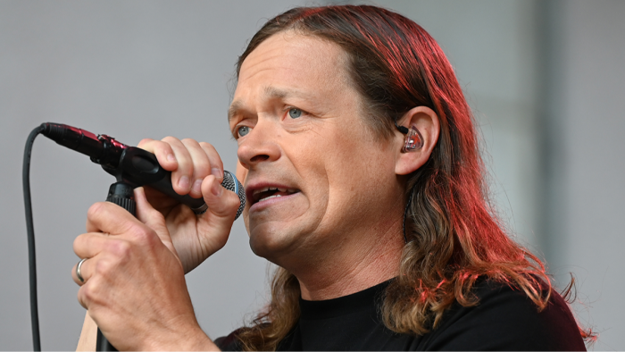 Brad Arnold performing on stage, lead singer of 3 Doors Down