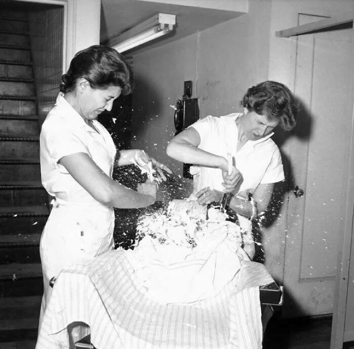 "Barber School Students Attempt Shaving A Balloon, 1959"