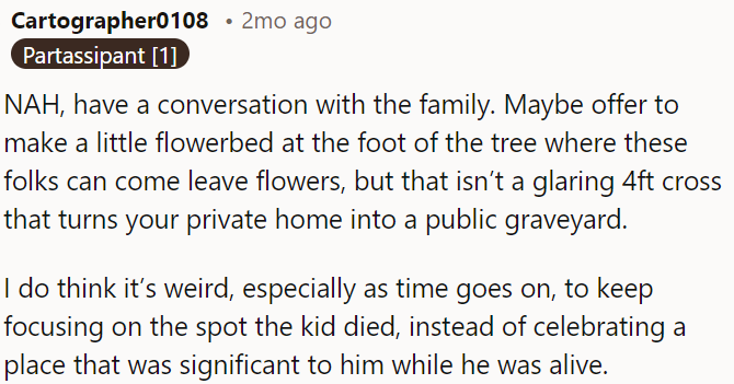 OP can talk to the family and suggest a small flowerbed instead of a large cross.