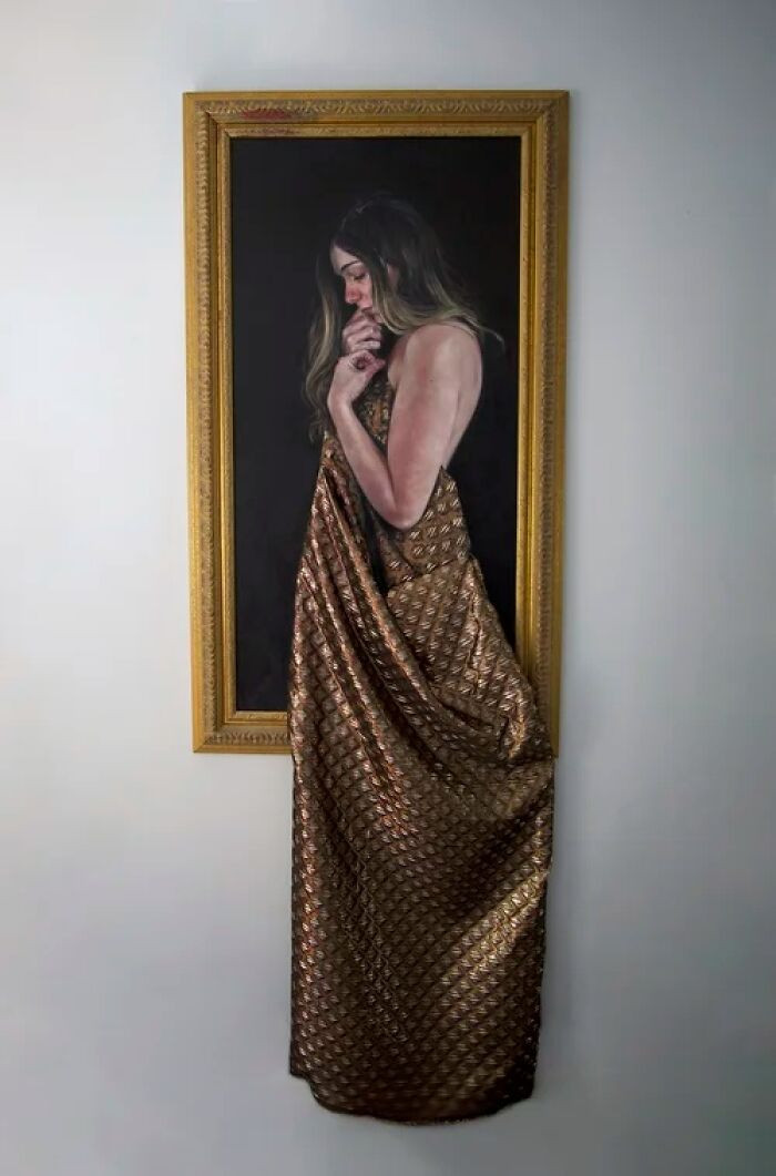 "Oil on canvas with applied fabric."